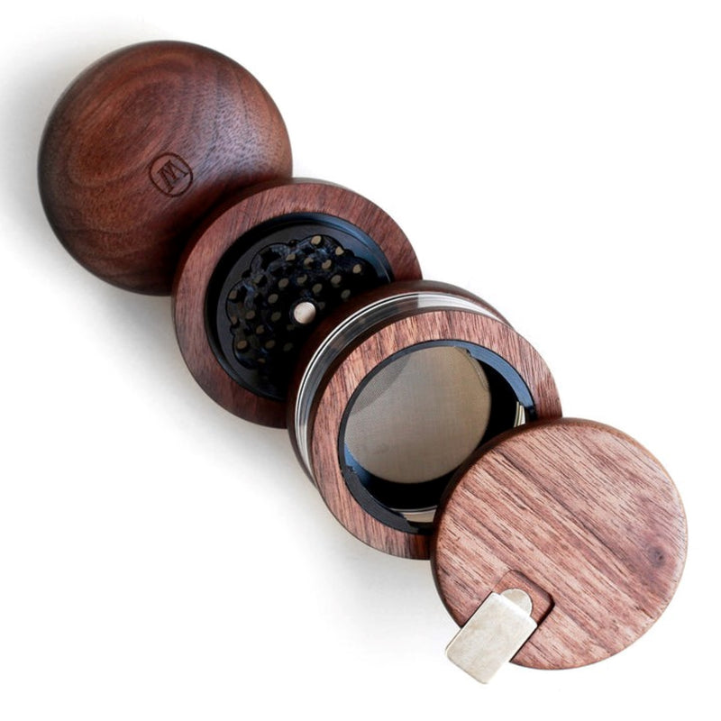 a set of three wooden grinders sitting on top of each other