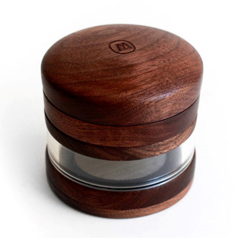a wooden container with a metal lid