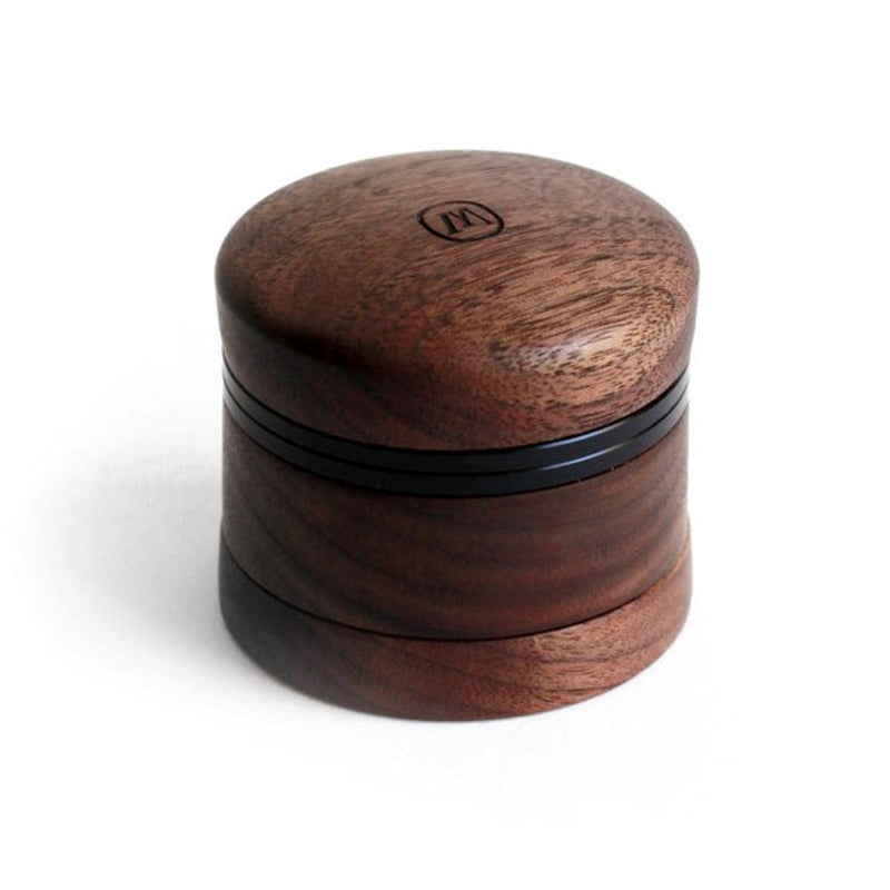 a small wooden box with a monogram on the lid