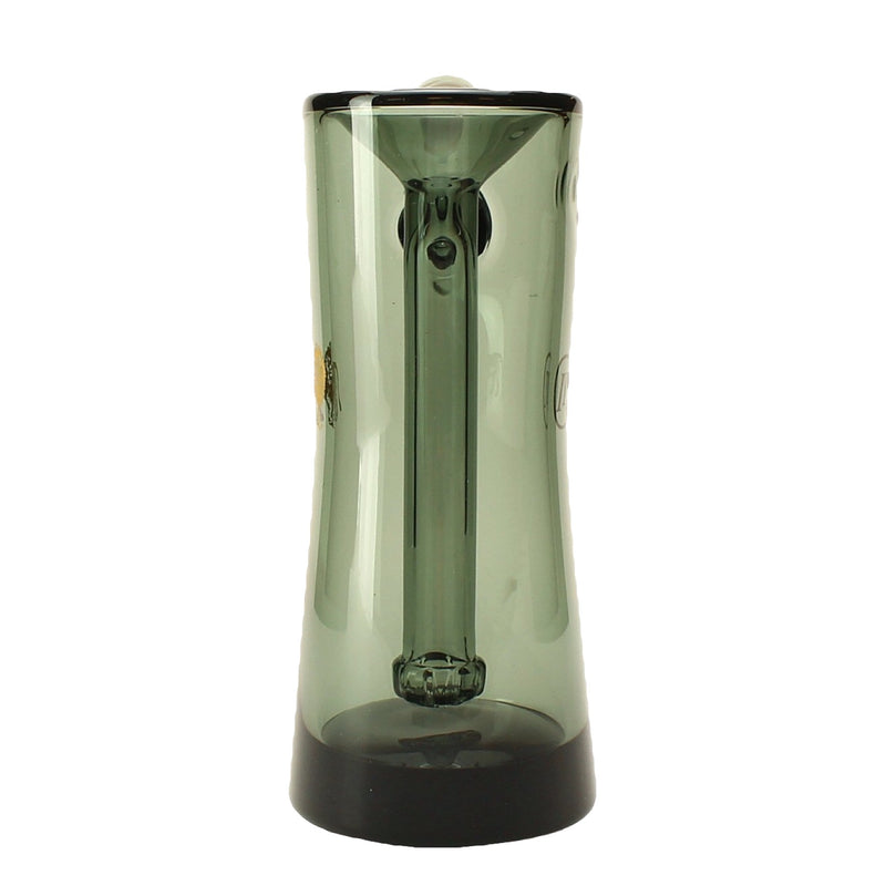 a green glass vase with a black base