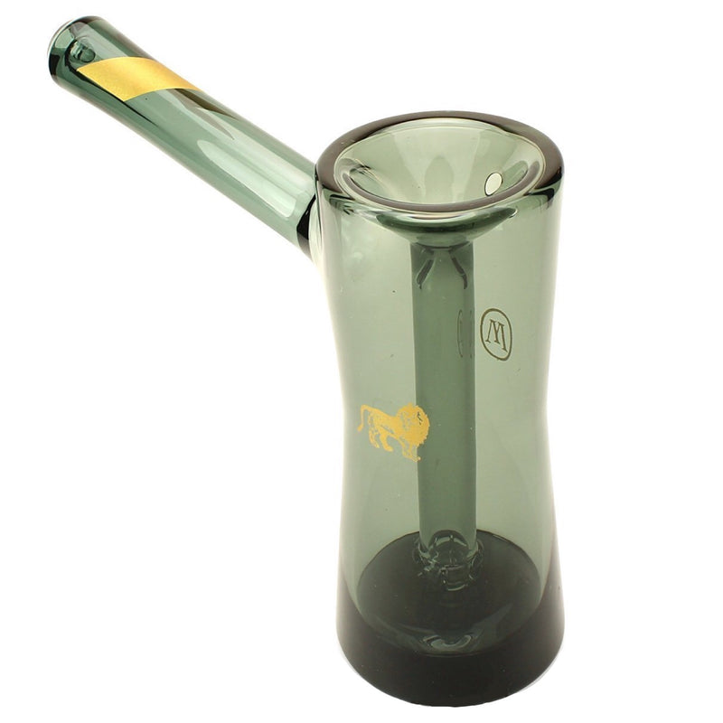 a green glass water pitcher with a yellow handle
