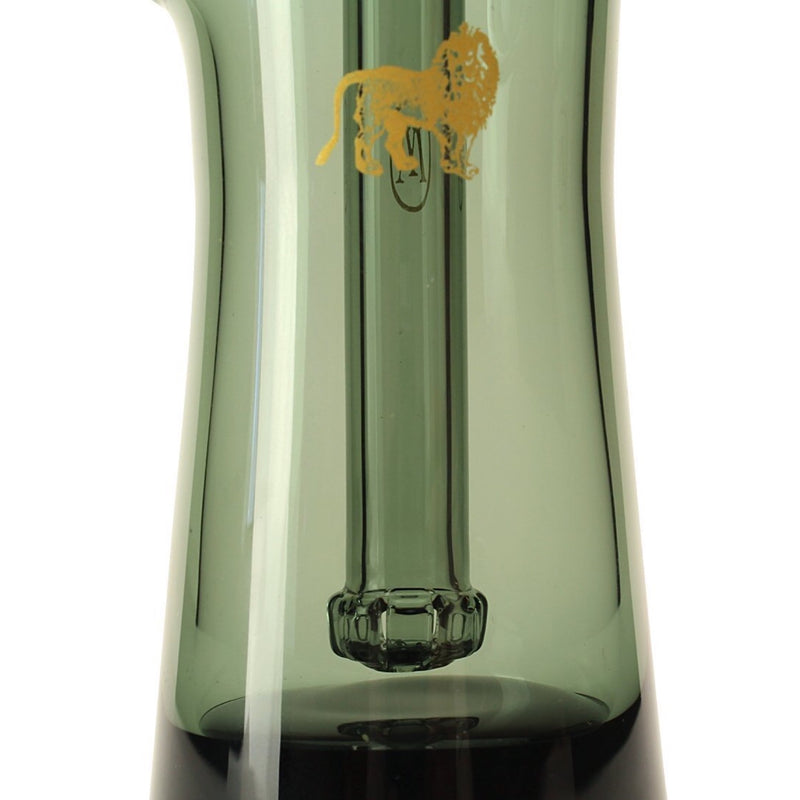 a green vase with a yellow lion on it
