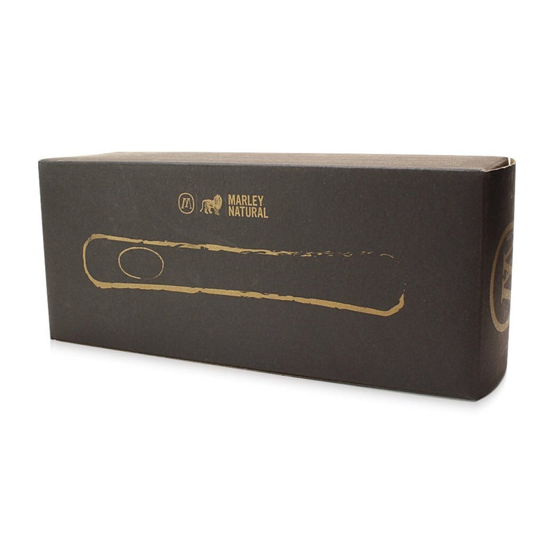 a black box with a gold handle on a white background