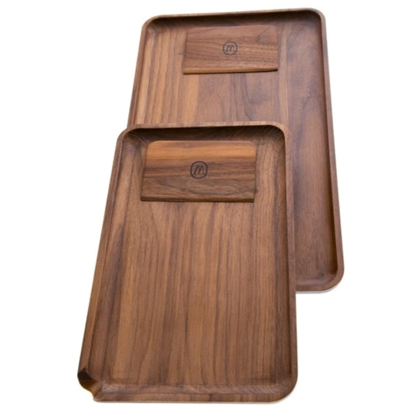 two wooden trays with one empty and one empty