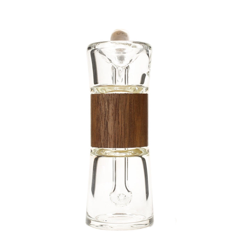 a glass bottle with a wooden cap
