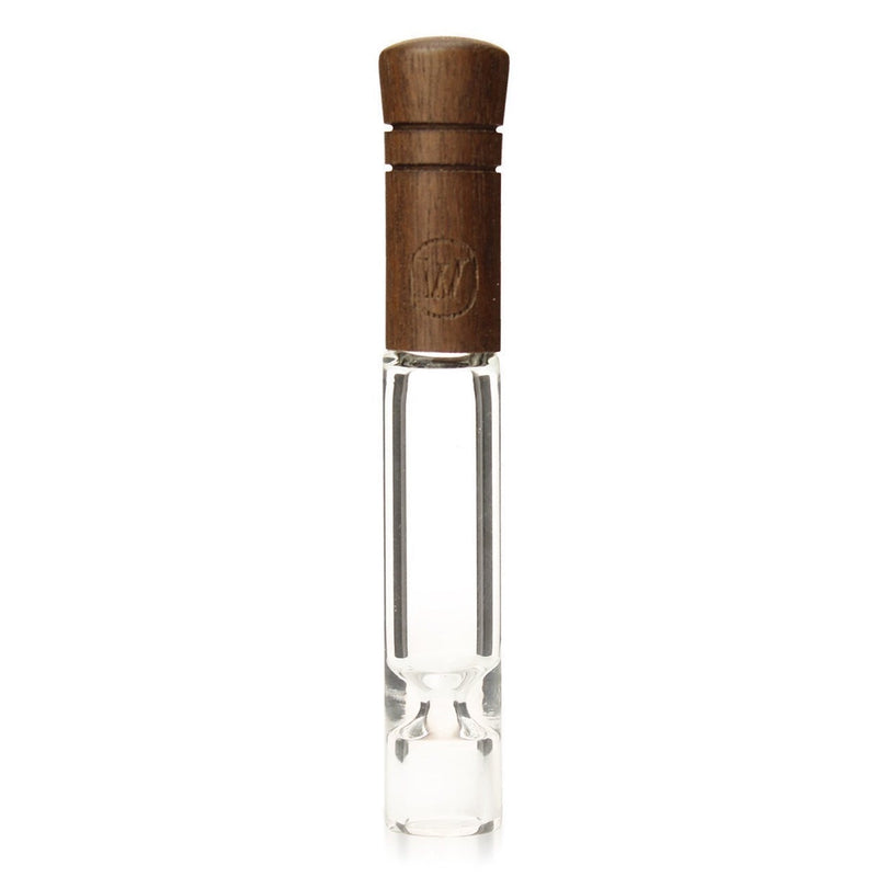 a glass bottle with a wooden stopper