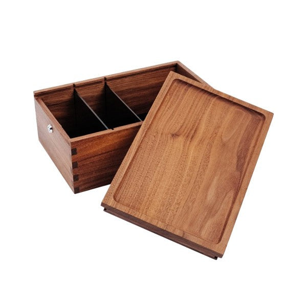 a wooden box with two compartments on top of it