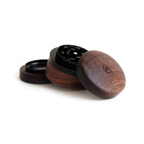 three wooden grinders sitting on top of each other