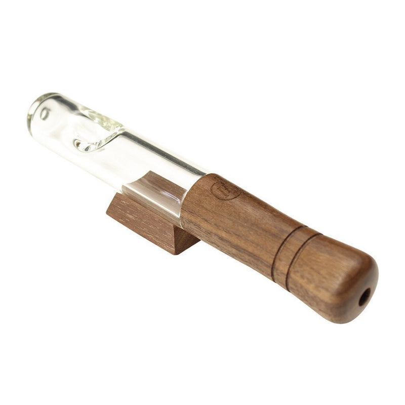 a wooden pen with a glass top on a white background