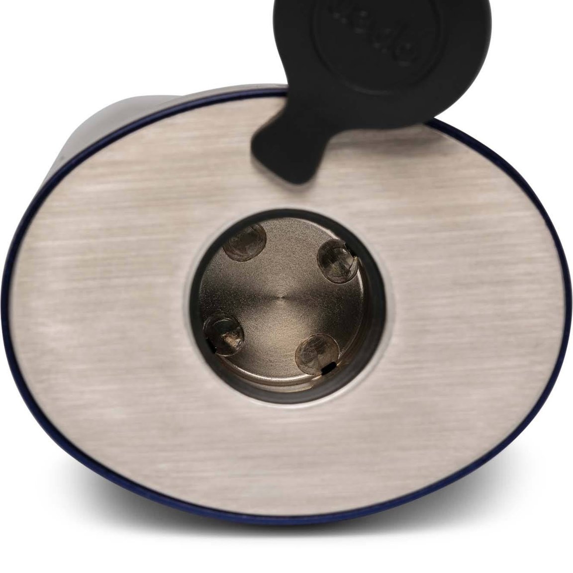 a close up of a metal object on a white background